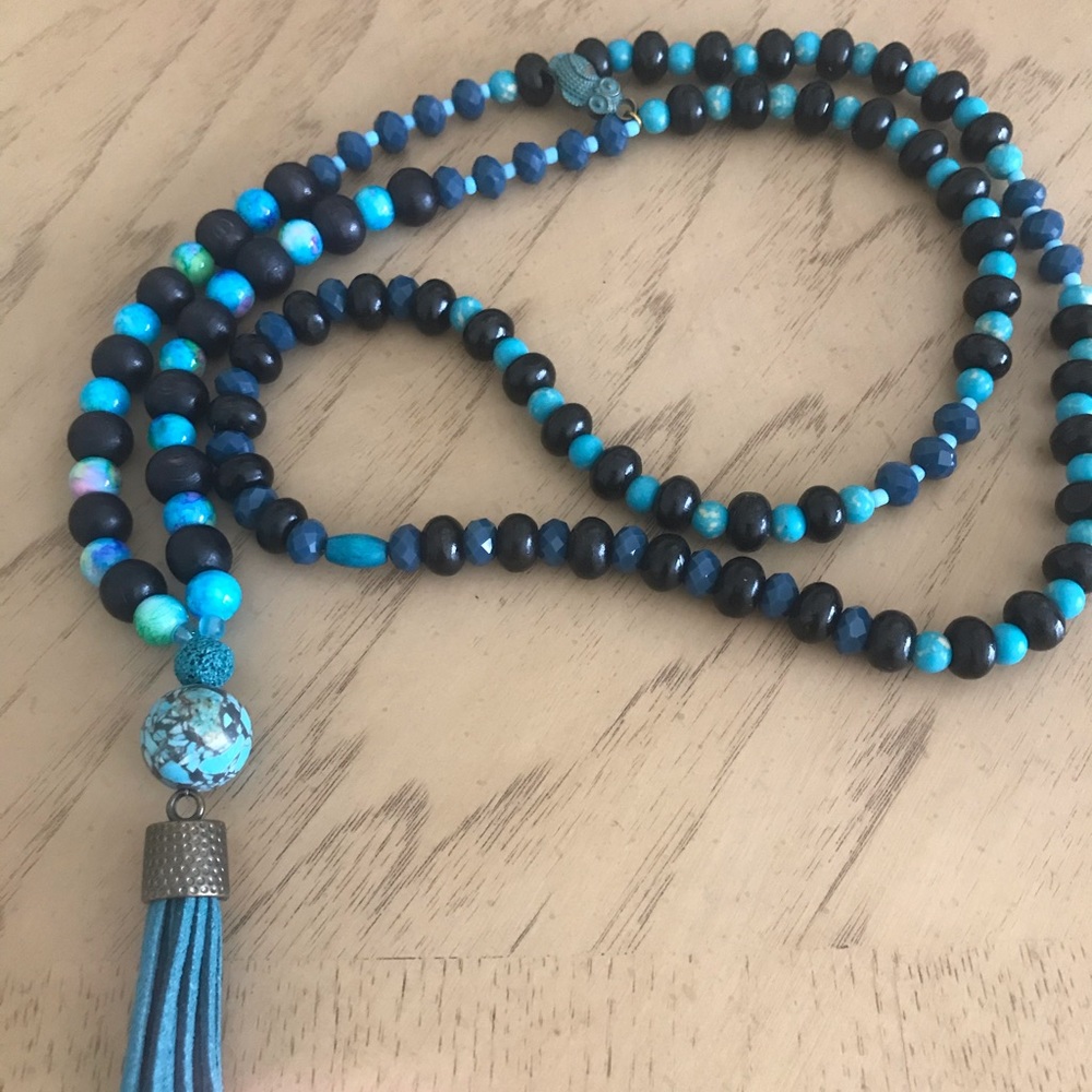 Neclace semi precious beads with leather tassel